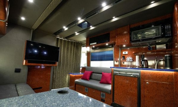 Galaxy tour bus front lounge